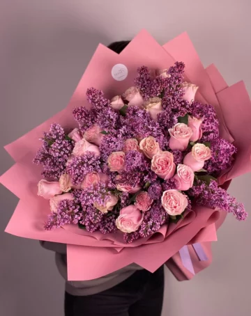 Bouquet of roses and lilacs